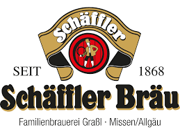 Ein traditionelles Brauerei-Logo mit goldenen und schwarzen Farben sowie einem Mann in Tracht.
